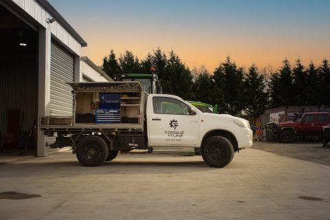 Torque and Tune mobile service ute outside the Prebbleton workshop at dawn